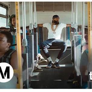 Portrait of Nipsey Hussle celebrating his community legacy and music career