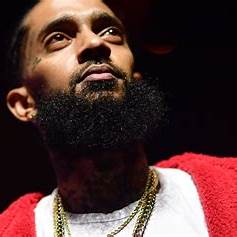 Fans gather at Nipsey Hussle’s memorial in Los Angeles honoring his impact